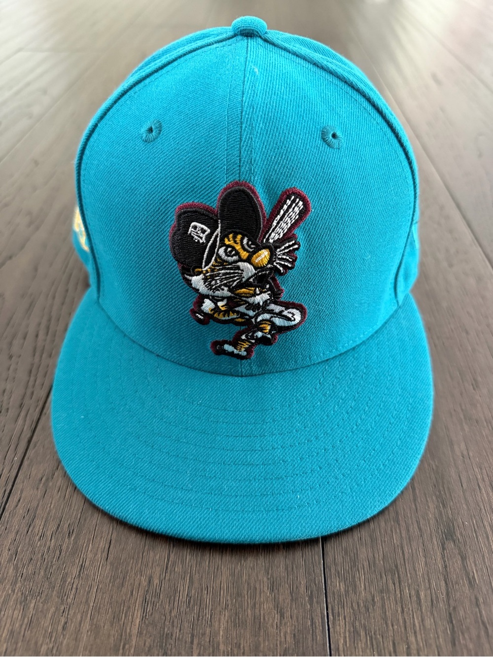 New Era Teal Men’s Baseball Cap with Mascot Patch